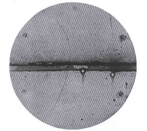 Cloud chamber photo of a positron, the first-discovered antimatter particle