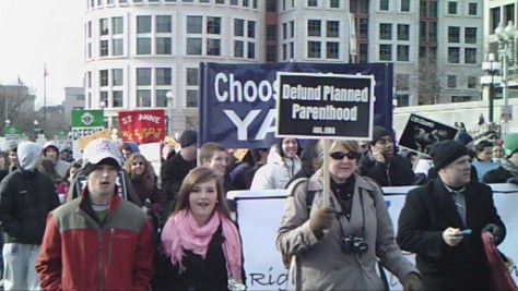Children and adults marching in the annual Pro-Life spectacle, the March for Life