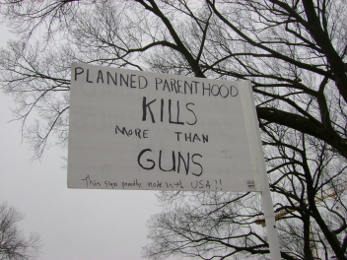 Planned Parenthood kills more than guns. An anti-abortion and anti-gun control message from the 2013 March for Life. This represents one of the two Americas.
