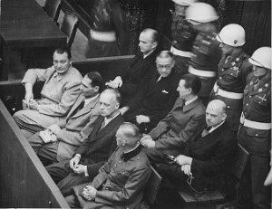 A reader asks four questions of one who remembered this trial and the parallels with the Nuremberg Laws