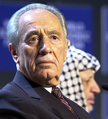 Shimon Peres and Yasser Arafat on stage together in 2001.