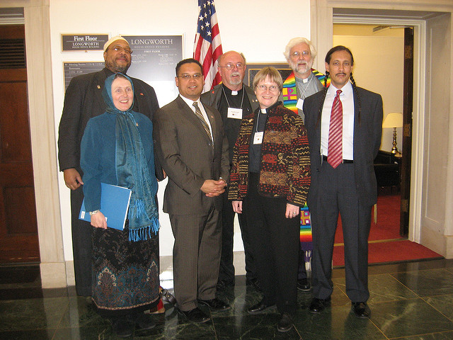 Keith Ellison, the Muslim pol, poses with misguided clergy in an ironic context.