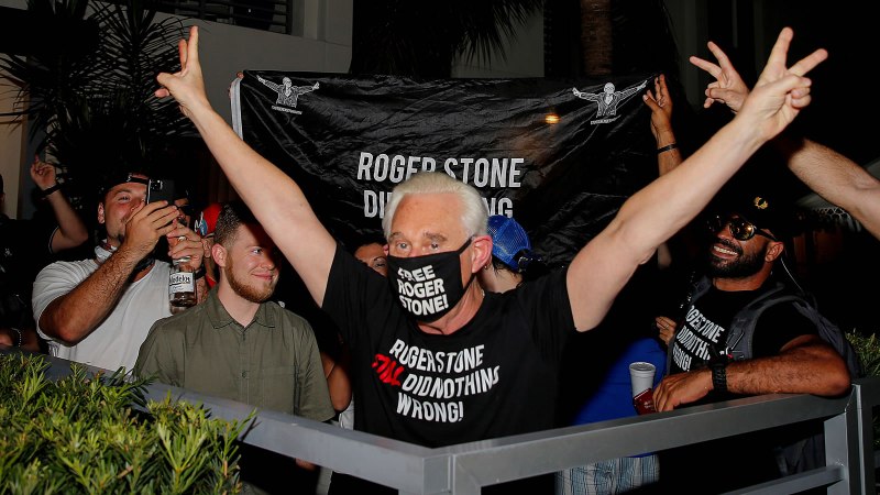 Roger Stone celebrates the commutation of his prison sentence outside his home.
