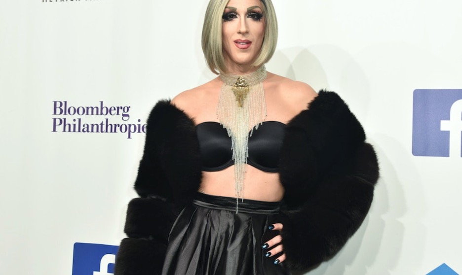 A "drag queen" celebrant poses for publicity photos