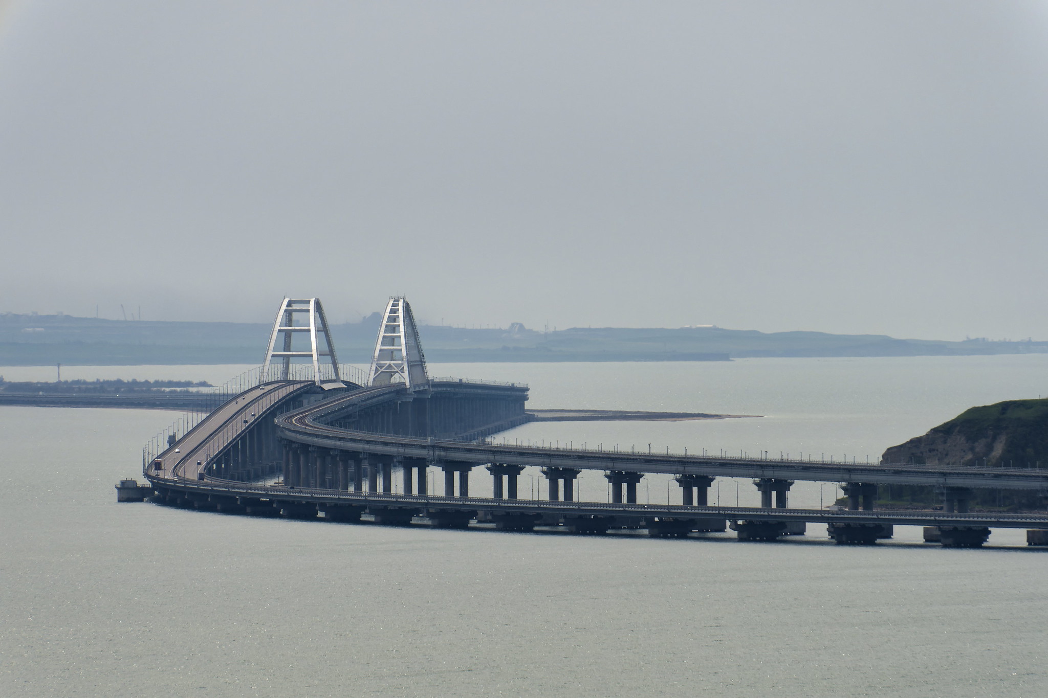 The Crimea bridge. "Kerch 110" by Alexxx1979 is licensed under CC BY-SA 2.0. To view a copy of this license, visit https://creativecommons.org/licenses/by-sa/2.0/?ref=openverse.