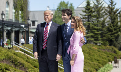 justin Trudeau and wife Sophie pose at the G7 summit with then President Trump