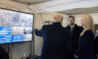 Donald J. Trump points to images from his big rally on January 6, 2021.