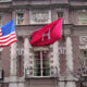 A Harvard building, with the American and Harvard flags - Claudine Gay recently resigned as its President