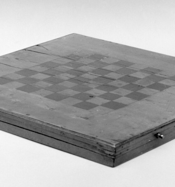 Classic black and white board game - chess, or checkers (draughts)