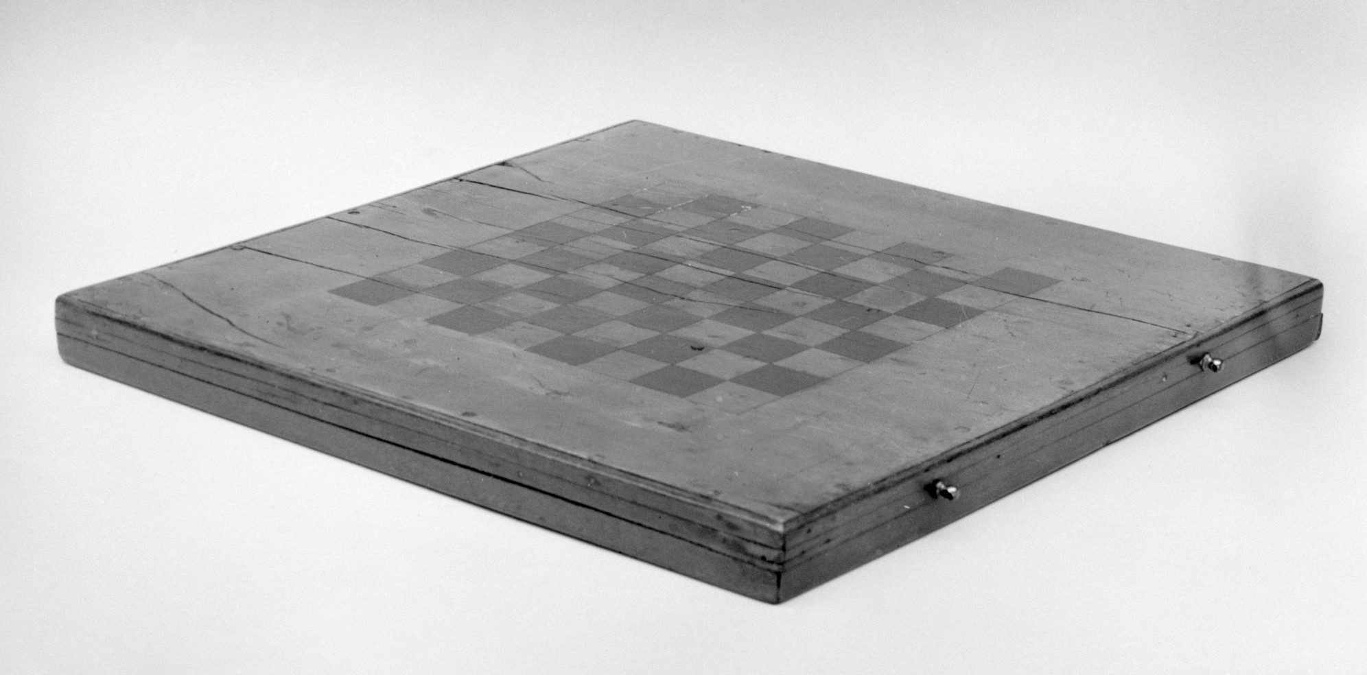 Classic black and white board game - chess, or checkers (draughts)