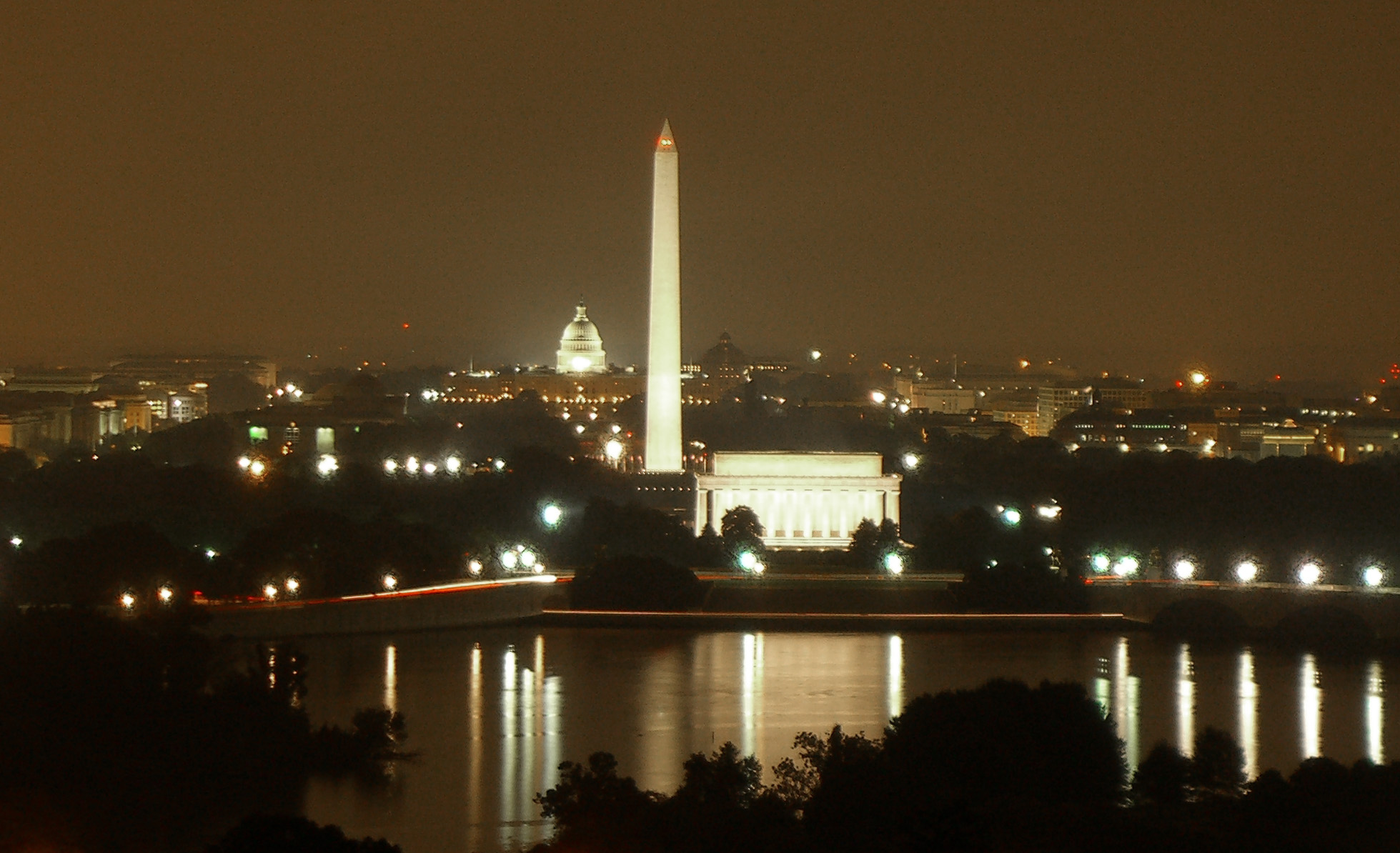 Washington, DC showing national mall, reflecting pool, and monument at night