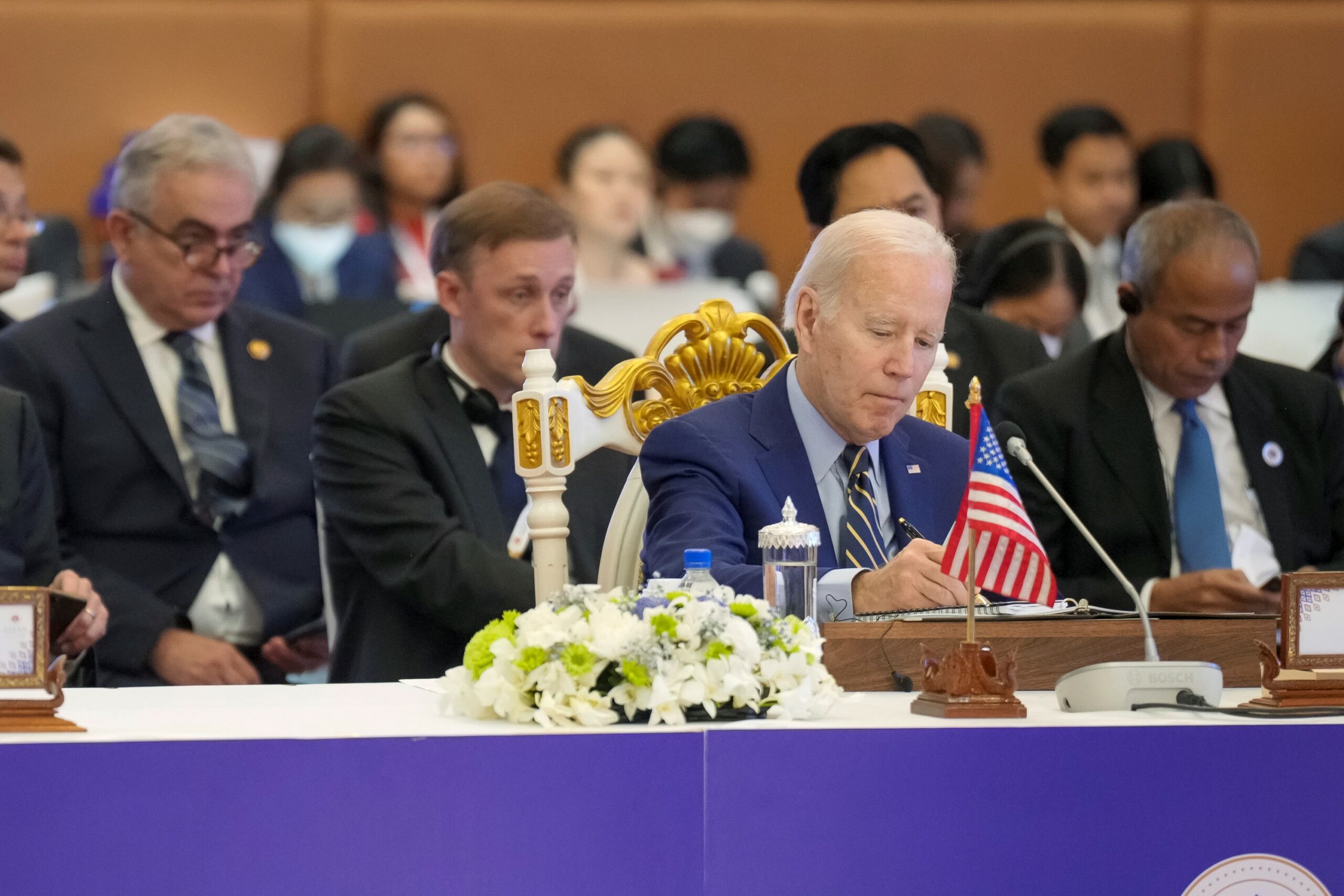 Biden seated at conference table