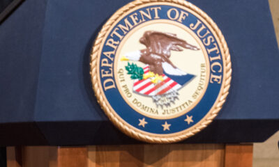 Department of Justice seal on Presidential style bulletproof podium