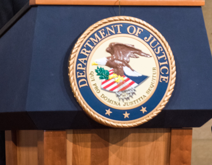 Department of Justice seal on Presidential style bulletproof podium