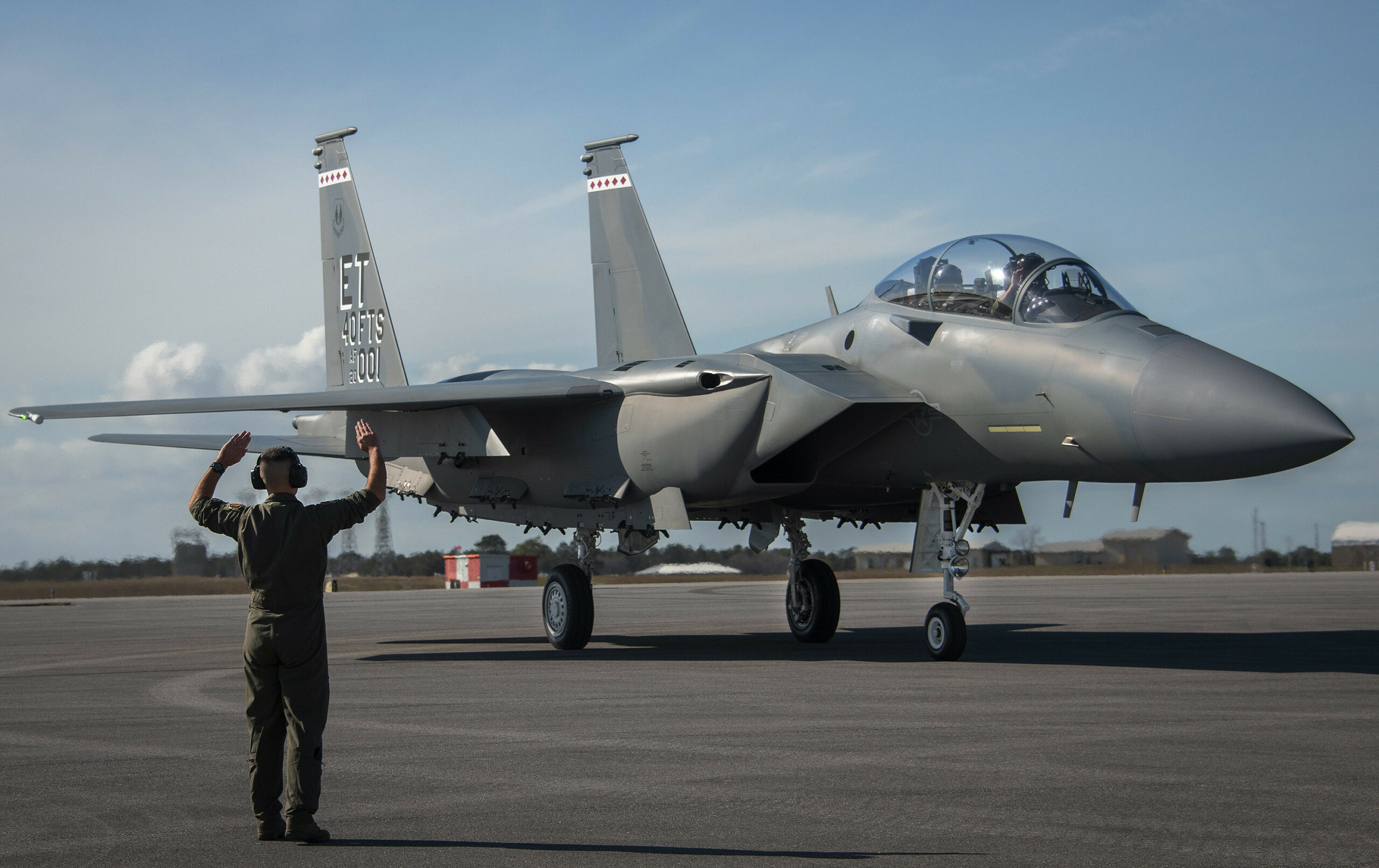 F-15 Strike Eagle from slightly right of front, preparing to take off