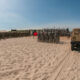 Troops gather on Normandy Beach to remember the fallen from D-Day or Operation Overlord