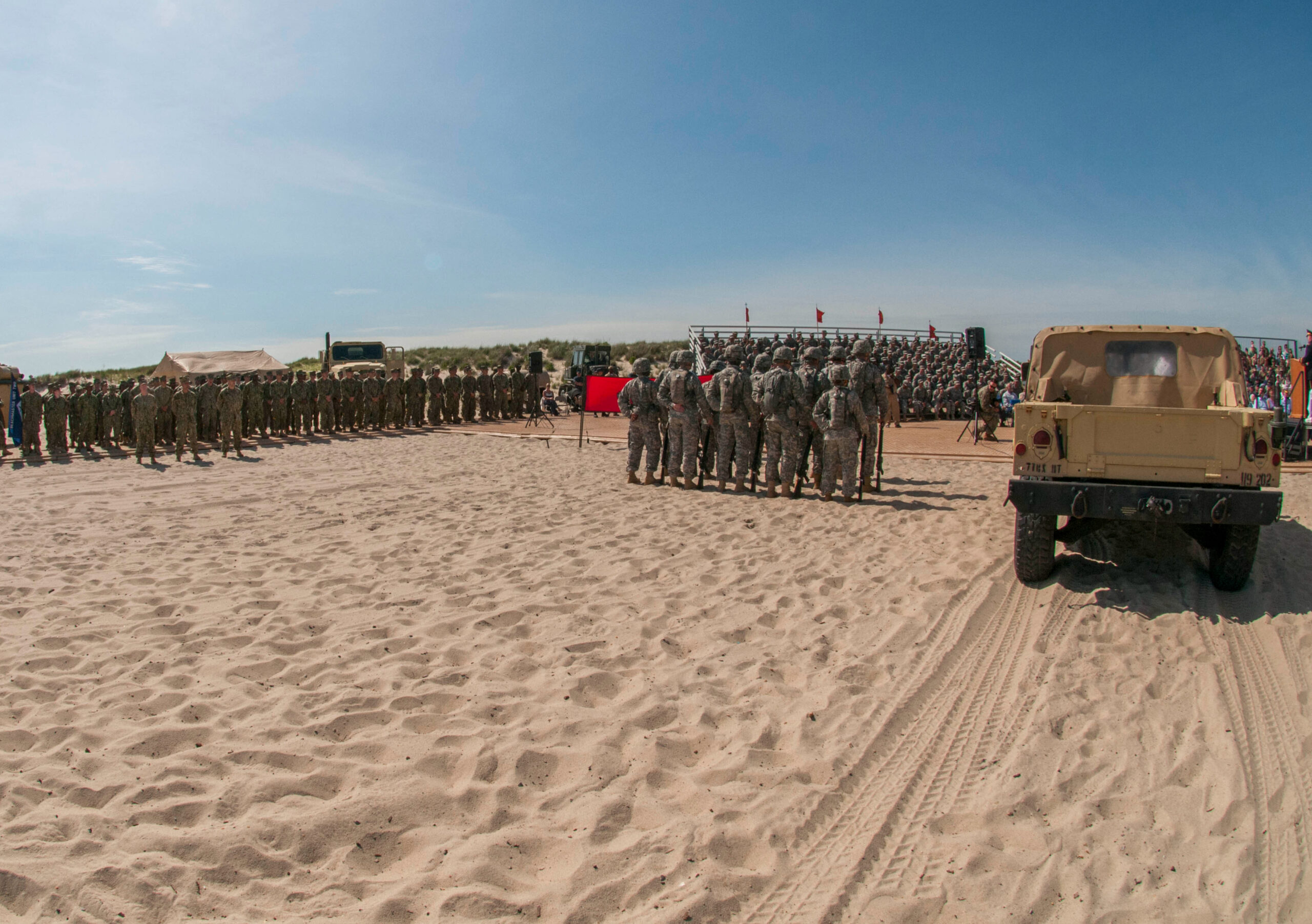 Troops gather on Normandy Beach to remember the fallen from D-Day or Operation Overlord