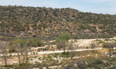 The U.S.-Mexican border, wide-angle with relatively short-standing fence in foreground, prime target for enhanced migration