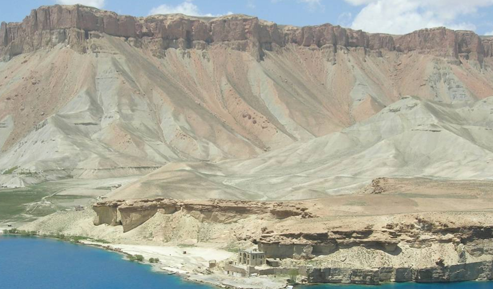 In Afghanistan, a river flows through a high-walled valley