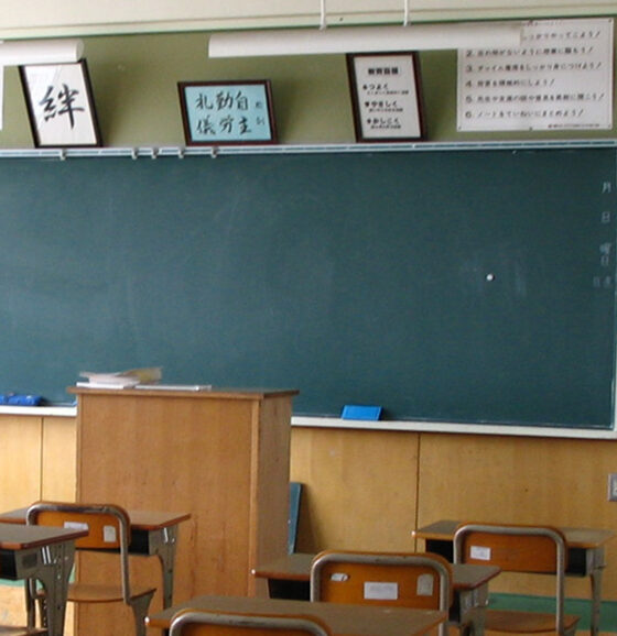 Classroom with Chinese characters on bulletins and chalkboard
