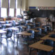 Classroom with desks facing away from chalkboard
