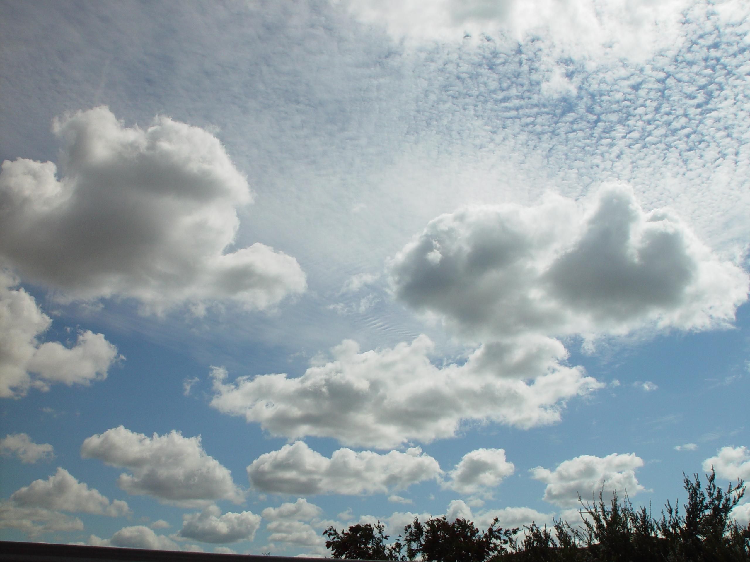 Cumulus and cirrocumulus clouds