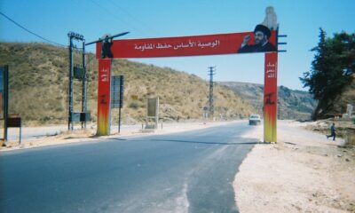 Hezbollah checkpoint with propaganda portrait of Nasrallah, its head