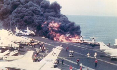 USS Forrestal CVA-59 suffering the fire that almos sank her