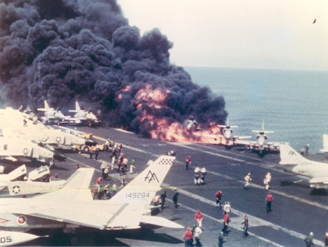 USS Forrestal CVA-59 suffering the fire that almos sank her