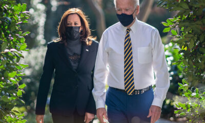 Biden and Harris outdoors and masked