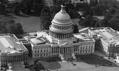 Capitol, aerial view of East Portico from First Avenue Southeast with National Mall in background