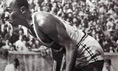 Jesse Owens on his mark in a track meet