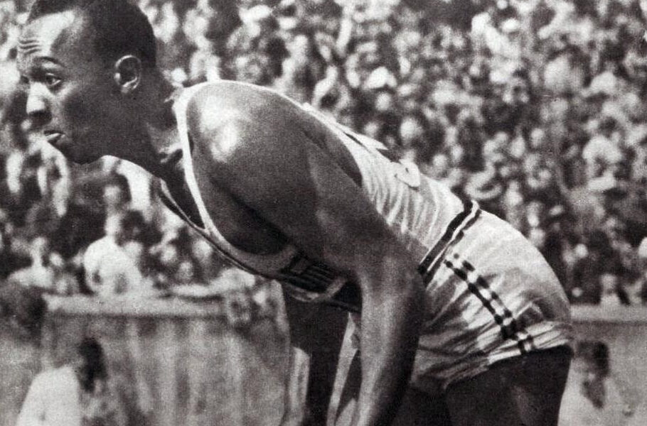 Jesse Owens on his mark in a track meet