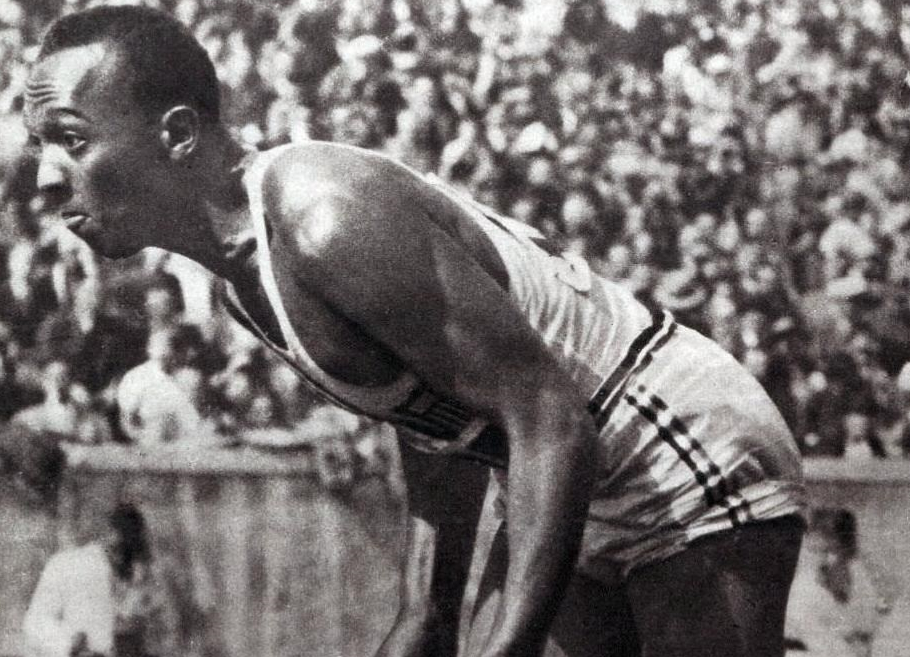 Jesse Owens on his mark in a track meet