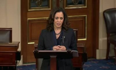 Senator Kamala Harris addresses the chair from her desk in the Senate chamber