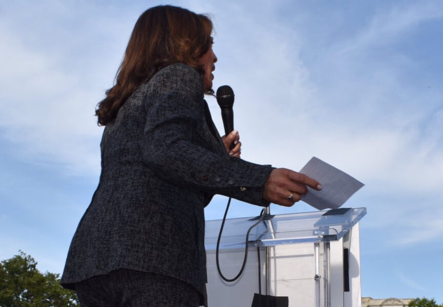 Senator Kamala Harris addresses an outdoor crowd