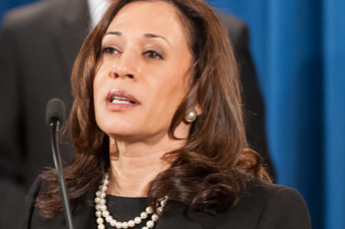 Kamala Harris addressing a meeting at the Justice Department