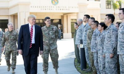 President Donald Trump inspects troops outside CENTCOM HQ