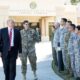 President Donald Trump inspects troops outside CENTCOM HQ