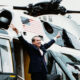 President Richard M. Nixon flashes his double victory sign before boarding Marine One for the last time.