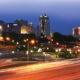 Shreveport, Louisiana skyline at night long-term exposure with well-trafficked thoroughfare in foreground