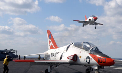 T-45 Goshawk jet trainers landing aboard USS Theodore Roosevelt CVN 71