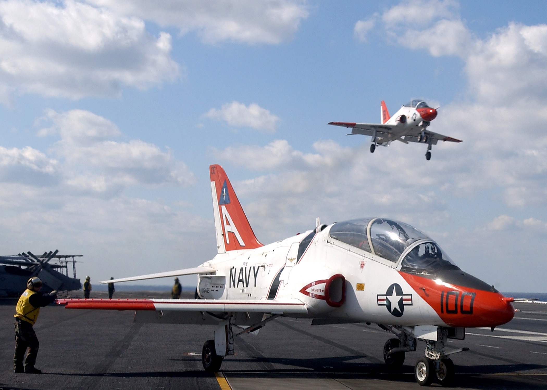 T-45 Goshawk jet trainers landing aboard USS Theodore Roosevelt CVN 71