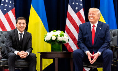 Volodymyr Zelensky and Donald Trump pose for a photograph