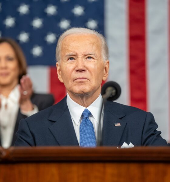 Joe Biden delivers the 2024 State of the Union address as Kamala Harris looks on