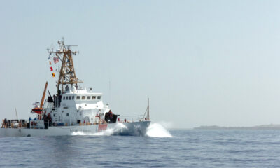 A Coast Guard cutter departs Guantanamo Bay harbor