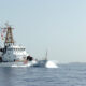 A Coast Guard cutter departs Guantanamo Bay harbor