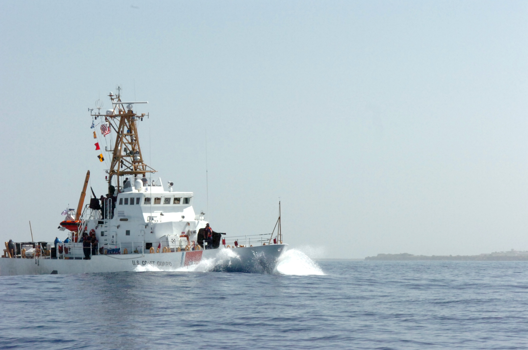 A Coast Guard cutter departs Guantanamo Bay harbor