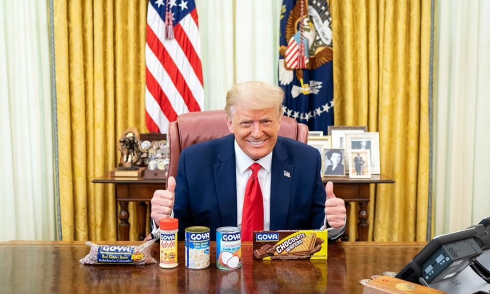 Donald Trump poses with a selection of Goya products on the Resolute Desk, to show his support for one company that didn't "go woke."