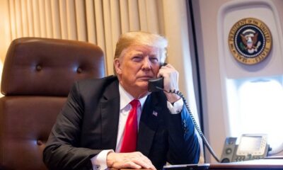 Donald Trump takes a phone call aboard Air Force One